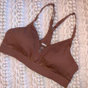 REI taupe colored sports bra with removable pads